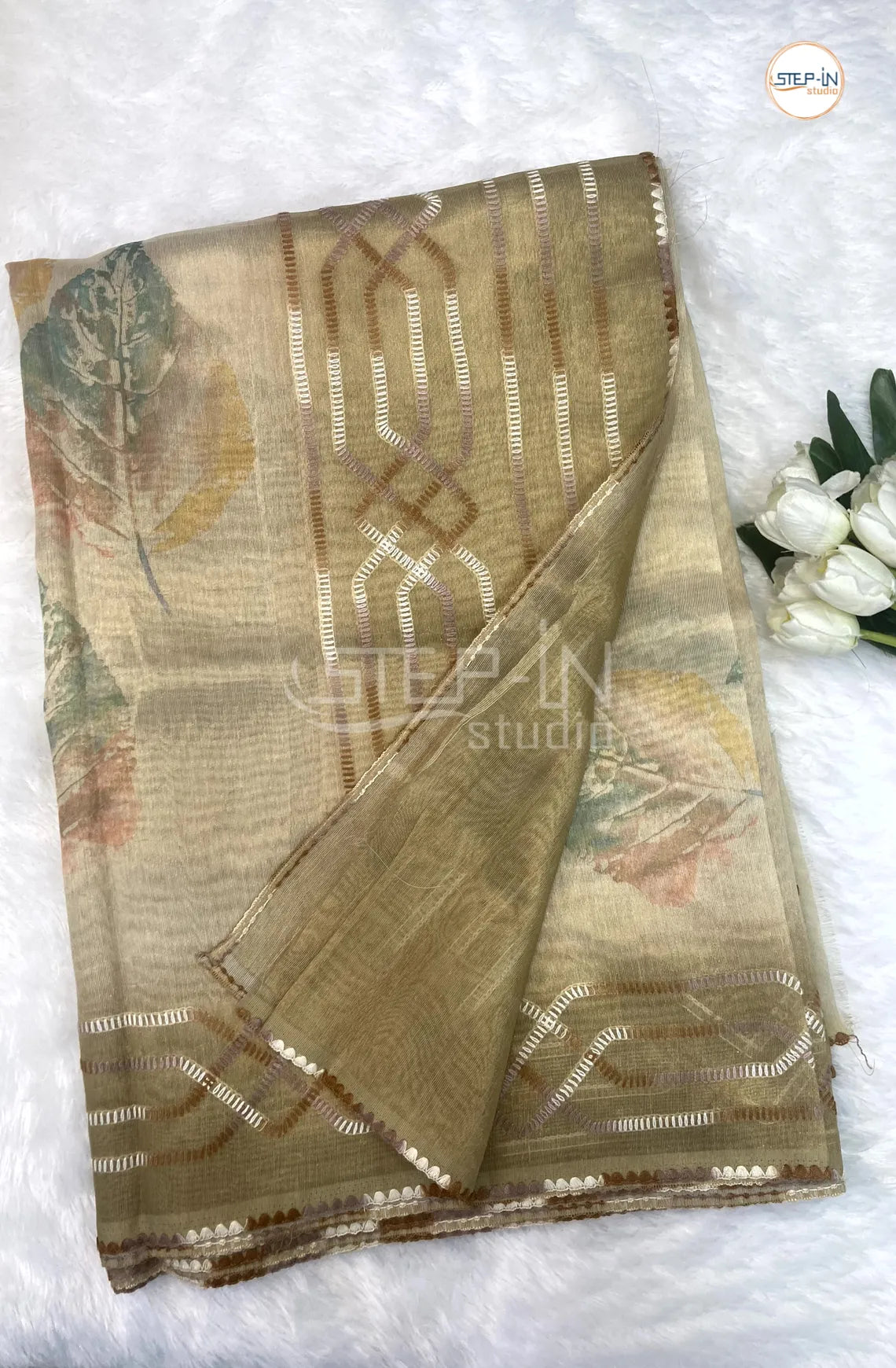 Gold Leaf Print Tissu Saree With Hand Embroiderd Pallu and Border & Contrast Blouse